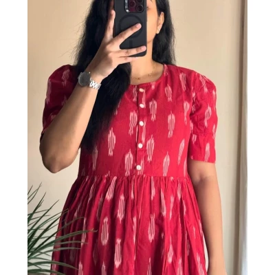 A model wearing Ikkat midi Dress For Women A model wearing Ikkat midi Dress For Women