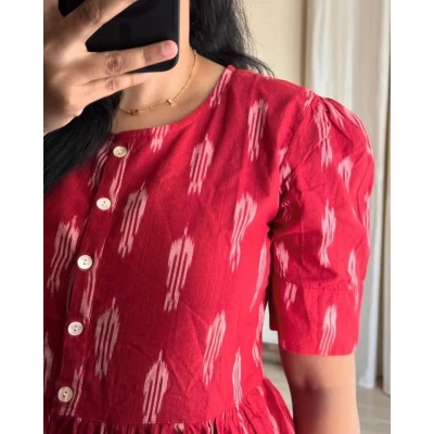 A model wearing Ikkat midi Dress For Women A model wearing Ikkat midi Dress For Women