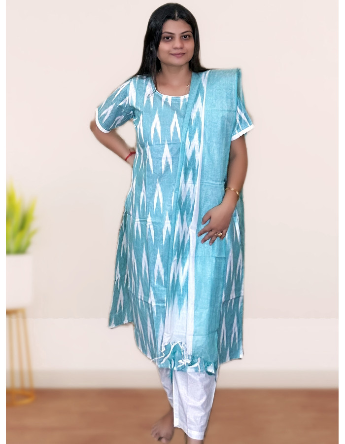 A model wearing Pure Cotton Ikkat Salwar suit Set For Women in sky blue colour A model wearing Pure Cotton Ikkat Salwar suit Set For Women in sky blue colour
