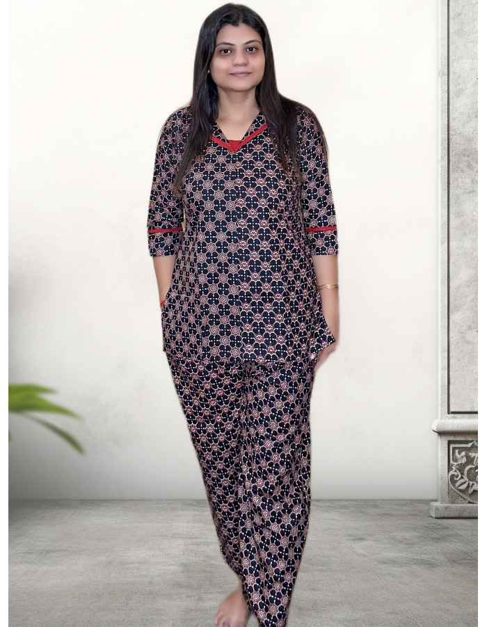 A model wearing Pure Cotton Printed Black Co-ord Set For Women A model wearing Pure Cotton Printed Black Co-ord Set For Women