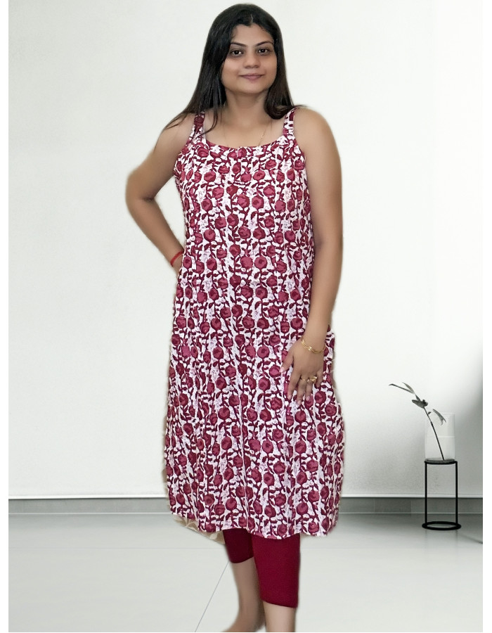 A model wearing Sleveless Pure Cotton Printed Kurti For Women A model wearing Sleveless Pure Cotton Printed Kurti For Women
