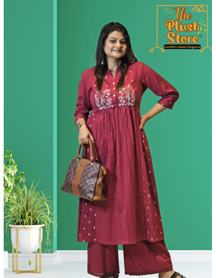 A model wearing Cotton-Linen 2 Piece Kurti Palazzo Set with Embroidery work For Women A model wearing Cotton-Linen 2 Piece Kurti Palazzo Set with Embroidery work For Women