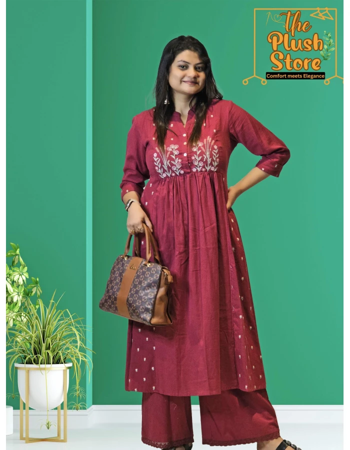 A model wearing Cotton-Linen 2 Piece Kurti Palazzo Set with Embroidery work For Women A model wearing Cotton-Linen 2 Piece Kurti Palazzo Set with Embroidery work For Women