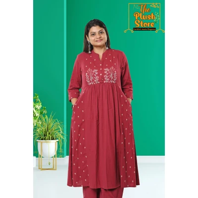 A model wearing Cotton-Linen 2 Piece Kurti Palazzo Set with Embroidery work For Women A model wearing Cotton-Linen 2 Piece Kurti Palazzo Set with Embroidery work For Women