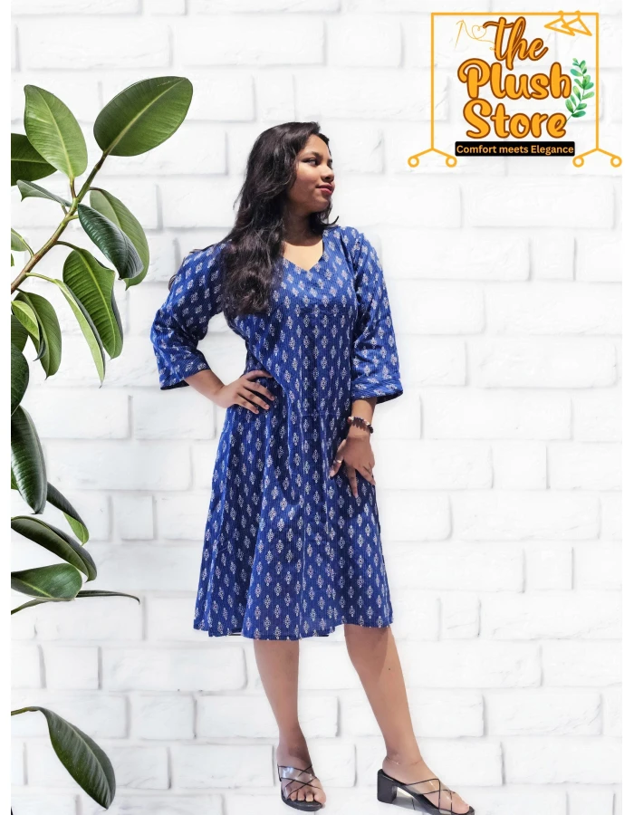 A model wearing Midi Dress In Pure Cotton For Women A model wearing Midi Dress In Pure Cotton For Women