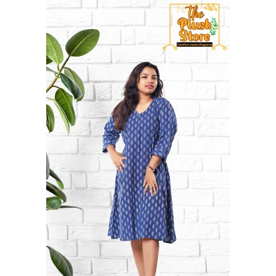 A model wearing Midi Dress In Pure Cotton For Women A model wearing Midi Dress In Pure Cotton For Women