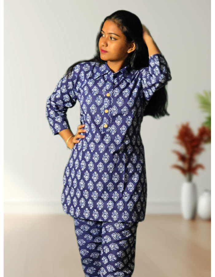 A model wearing Pure Cotton Blue Printed Co-ord Set For Women A model wearing Pure Cotton Blue Printed Co-ord Set For Women
