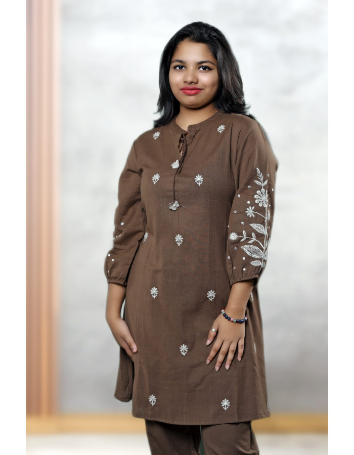 A model wearing Linen Hand Embroidered Special Co-ords For Women A model wearing Linen Hand Embroidered Special Co-ords For Women
