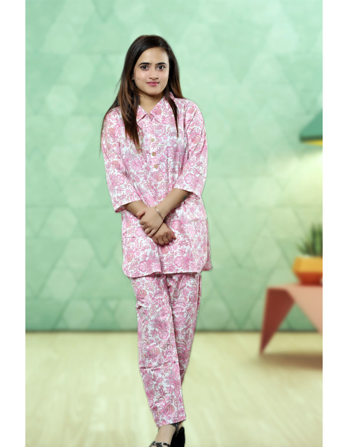 A model wearing Pink Pure Cotton Floral Co-ord Set For Women A model wearing Pink Pure Cotton Floral Co-ord Set For Women