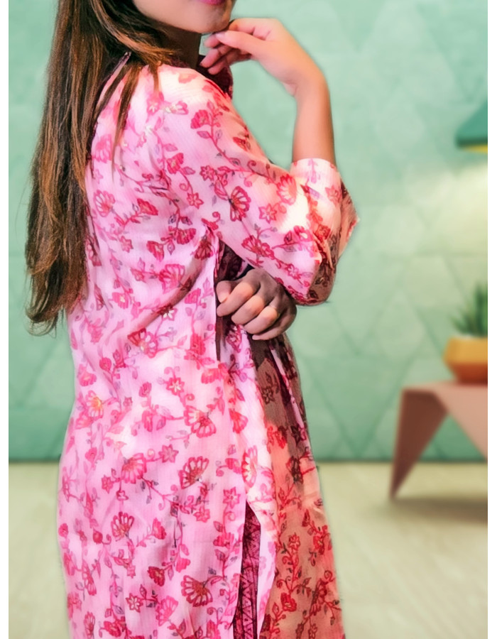 A model wearing Pink Floral Two Piece Kurti Pant Co-ord Set For Women A model wearing Pink Floral Two Piece Kurti Pant Co-ord Set For Women