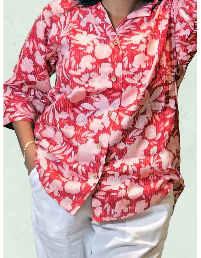 A model wearing Red Floral Printed Cotton Shirt For Women A model wearing Red Floral Printed Cotton Shirt For Women